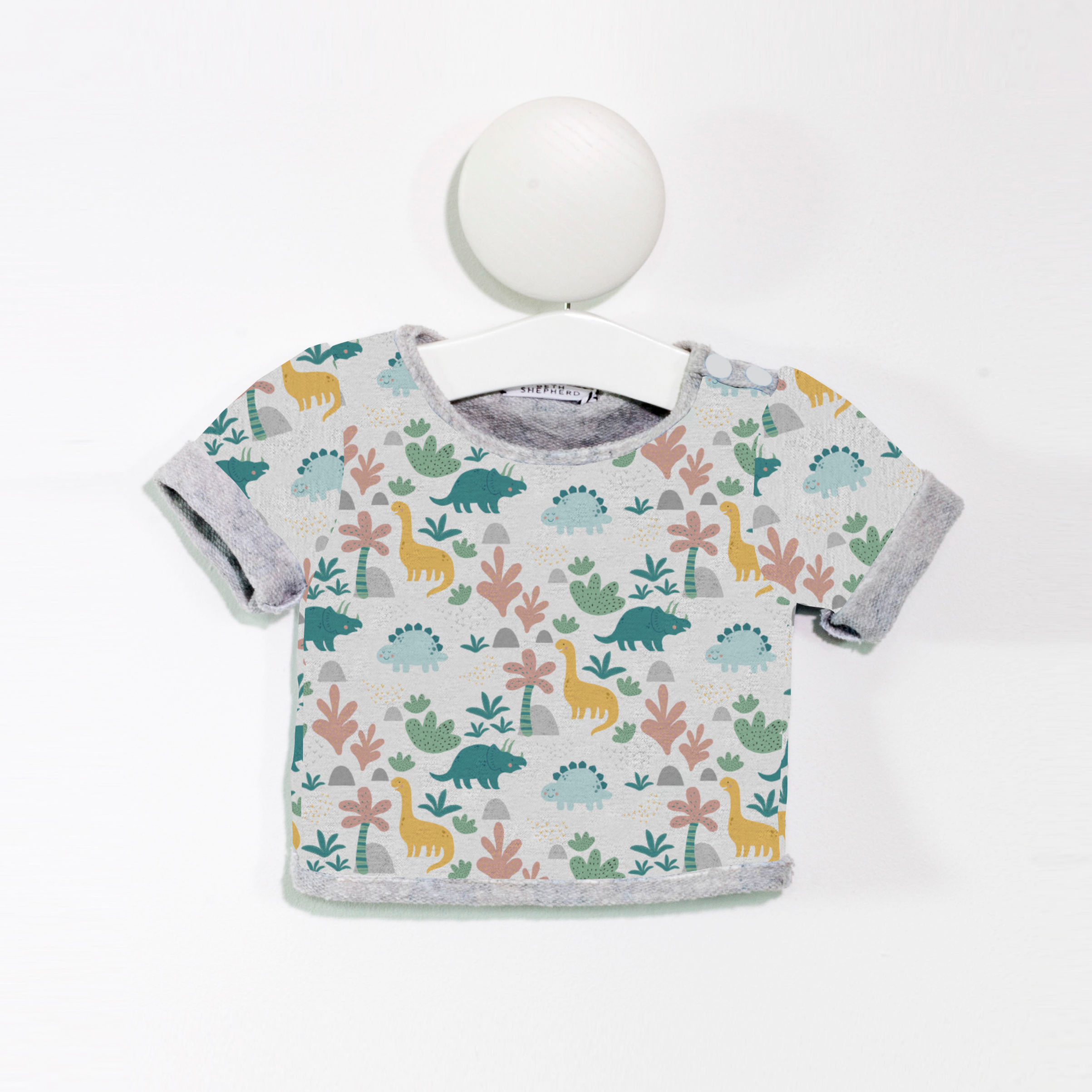 White dinosaur T shirt