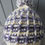 Thumbnail: Purple and cream crochet pompom hat