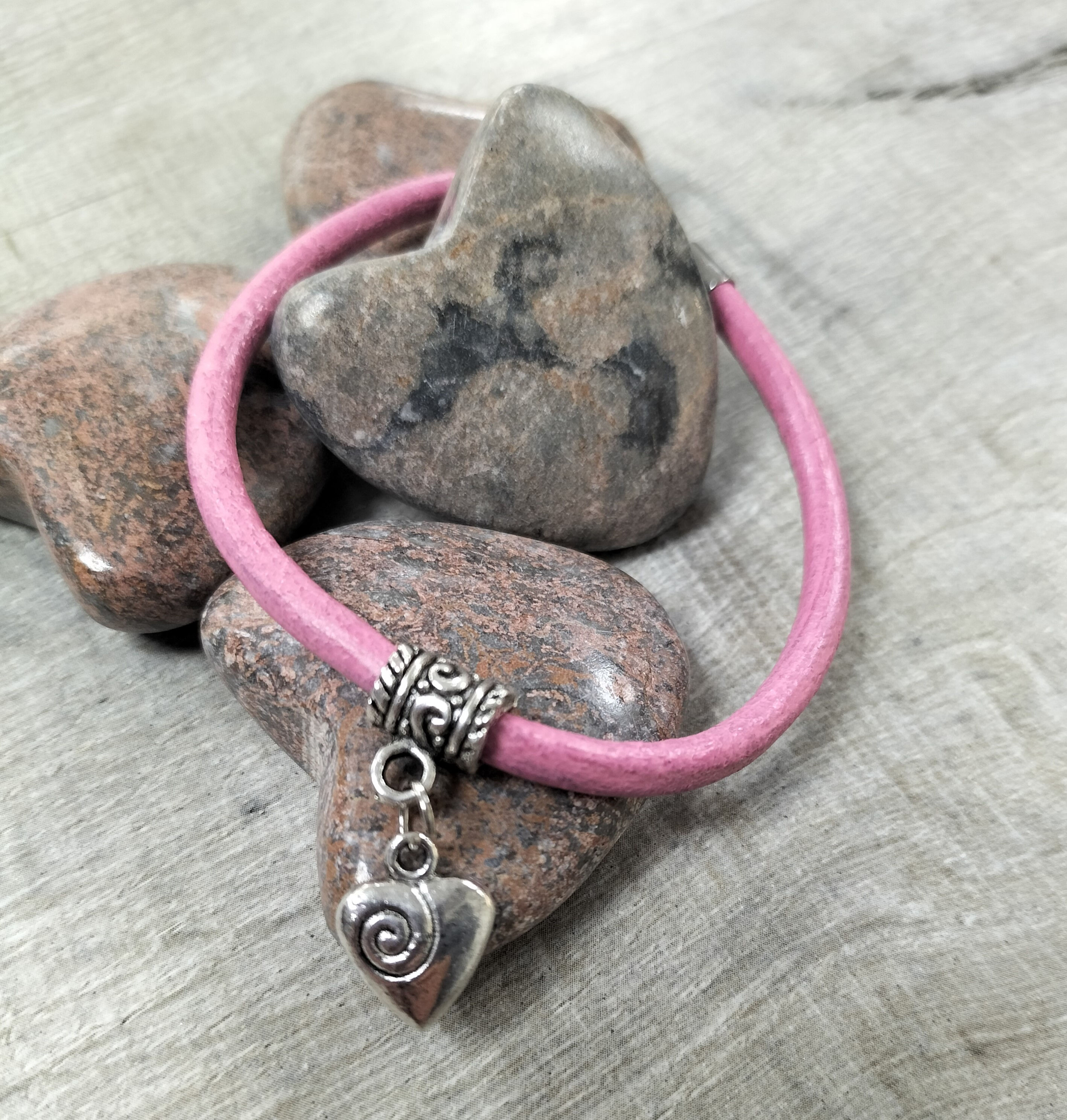 Pink leather bracelet with heart