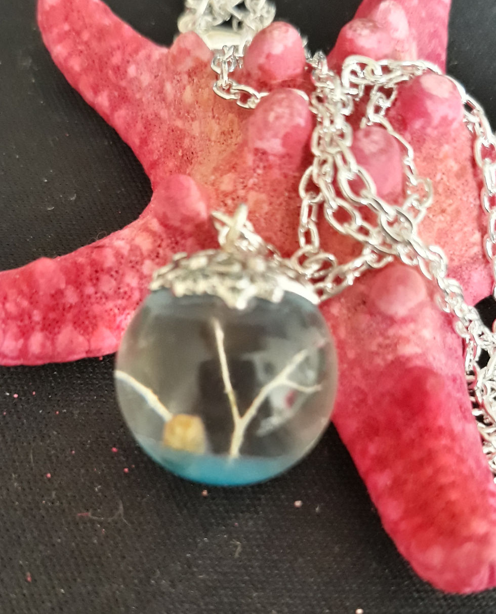 Beach themed resin globe necklace