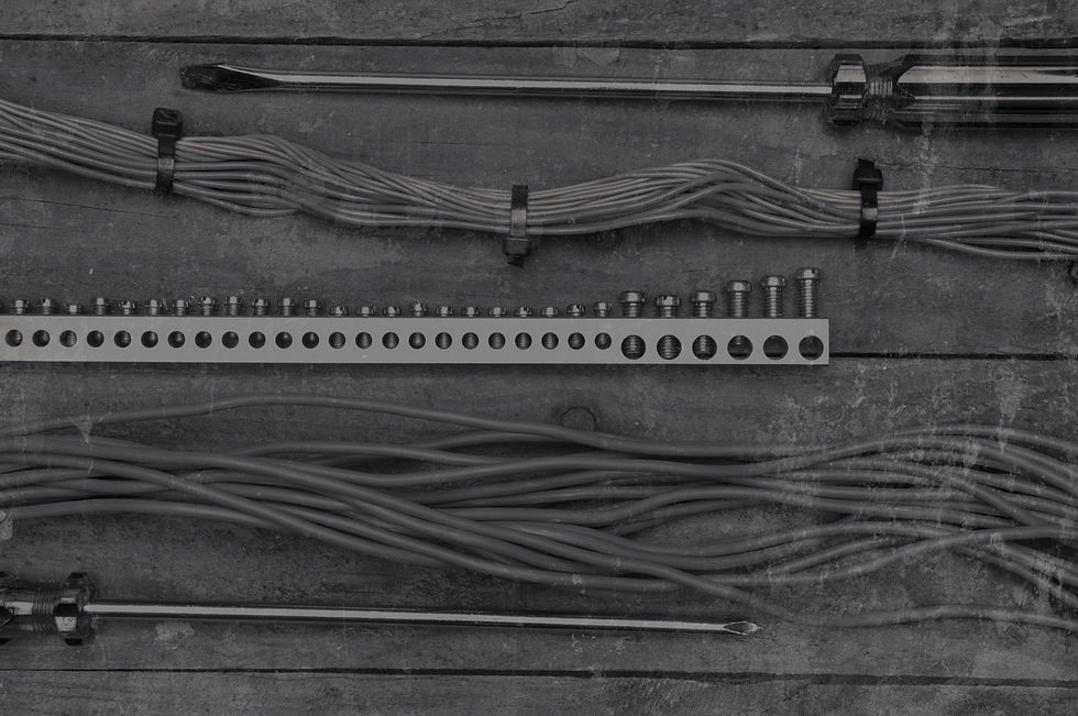 Electrician Tools and Wiring Laid Out on A Table Neatly