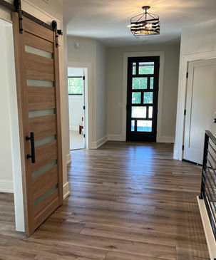 Vinyl plank flooring, Front door 8' tall from ThermaTru Pulse collection