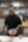 A chef from Urban Restaurant posing for a photo