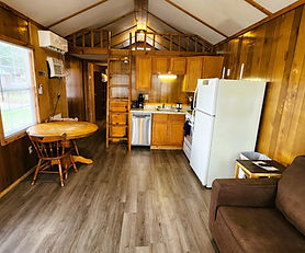 Lakefront 1-bedroom cabin with loft, full bath, hot tub, and pet-friendly accommodations. Perfect Grand Lake OK retreat for couples or small families.