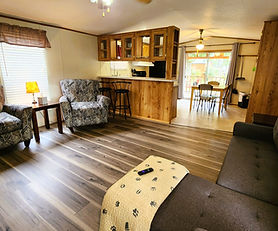 Cozy 2-bedroom, 2-bath Grand Lake OK cabin with queen beds, lake and pool views, and a spacious, relaxing interior.