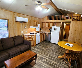 Relax in a lakefront 1-bedroom cabin with loft, full bath, kitchen, and stunning views—ideal Grand Lake OK retreat for couples or families.