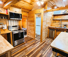 Charming lakefront 1-bedroom cabin with full bath, kitchen, and large patio with dining area and stunning lake views. Perfect for couples or small families.