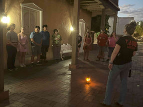 Guests exploring paranormal sites in Old Town Albuquerque