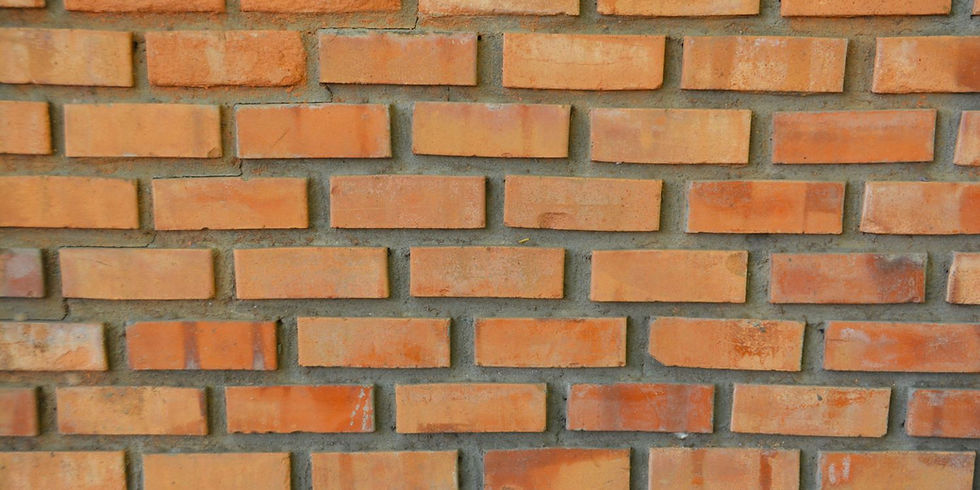 Mauer aus Backsteinen