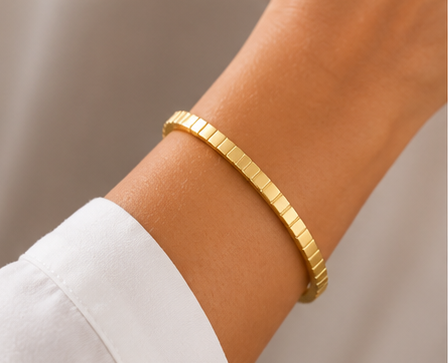 18K Gold Plated Geometric Bangle on a women's wrist