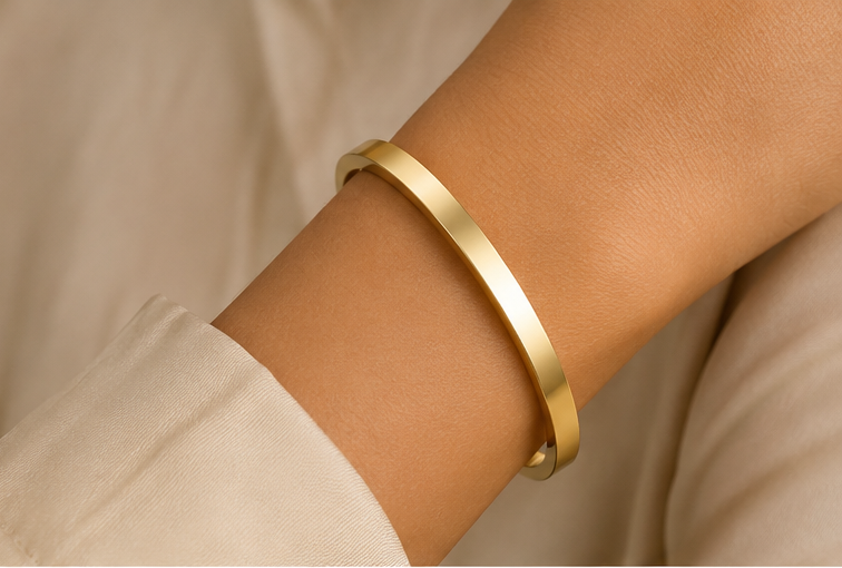 18K Gold Plated Aura Cuff Bangle on a women's wrist