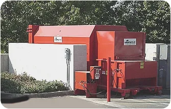 Red industrial compactor