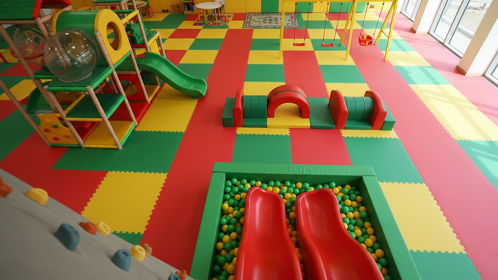 High angle view of outdoor play area with colorful play equipment