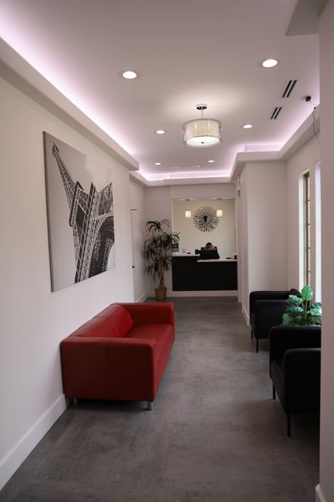 Modern dental office lobby at The Rowlett Dentist in Rowlett, TX, featuring cozy seating and a welcoming atmosphere for patients