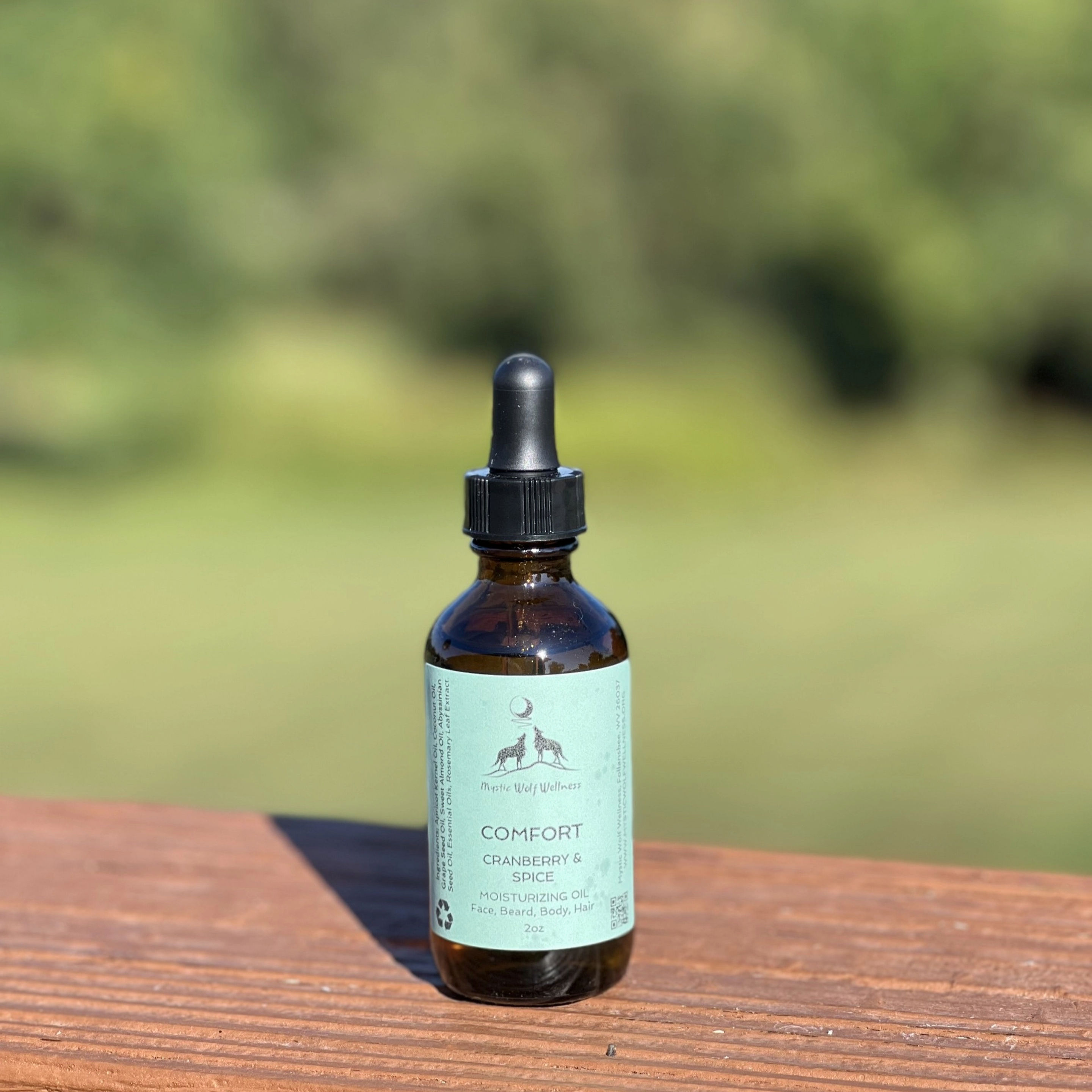 Bottle of Cranberry & Spice Natural Moisturizing Oil