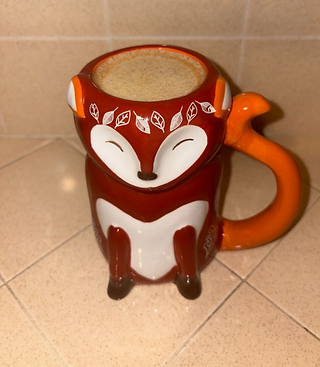 Golden Tea in a fox mug