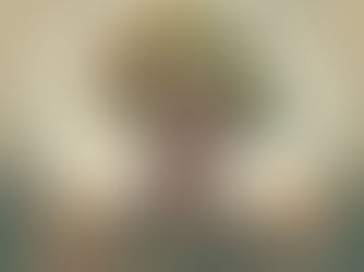 An image of a Tree blooming with a man next to the Tree