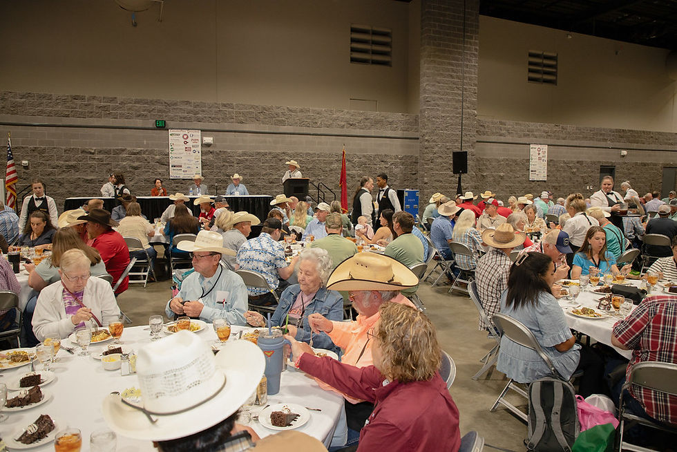 Cattle producers sitting in a room learning at convention.