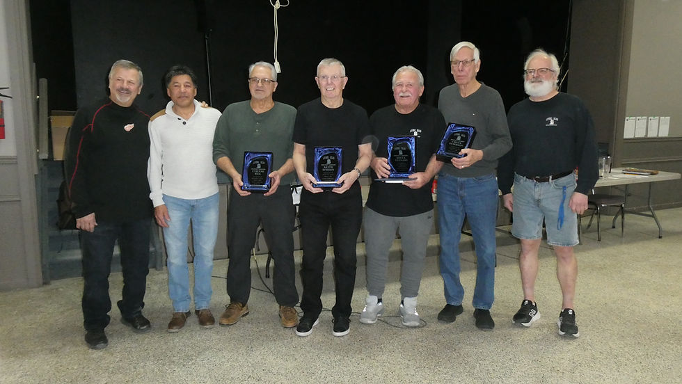 Four 80-year old hockey players honoured 