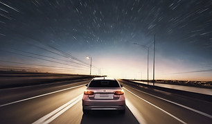 a car is driving on an empty road and th