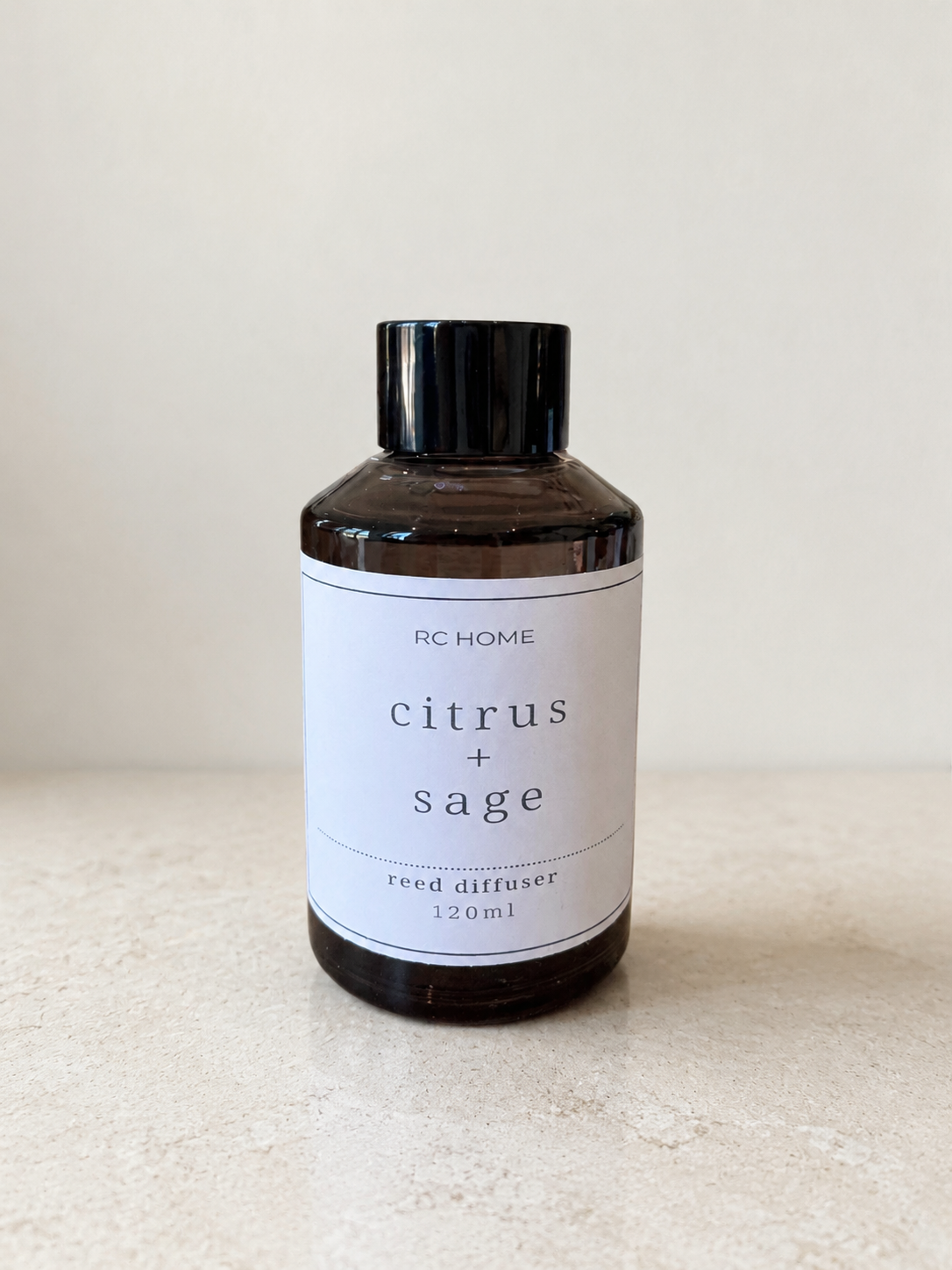 Citrus and Sage Reed Diffuser bottle by RC HOME.