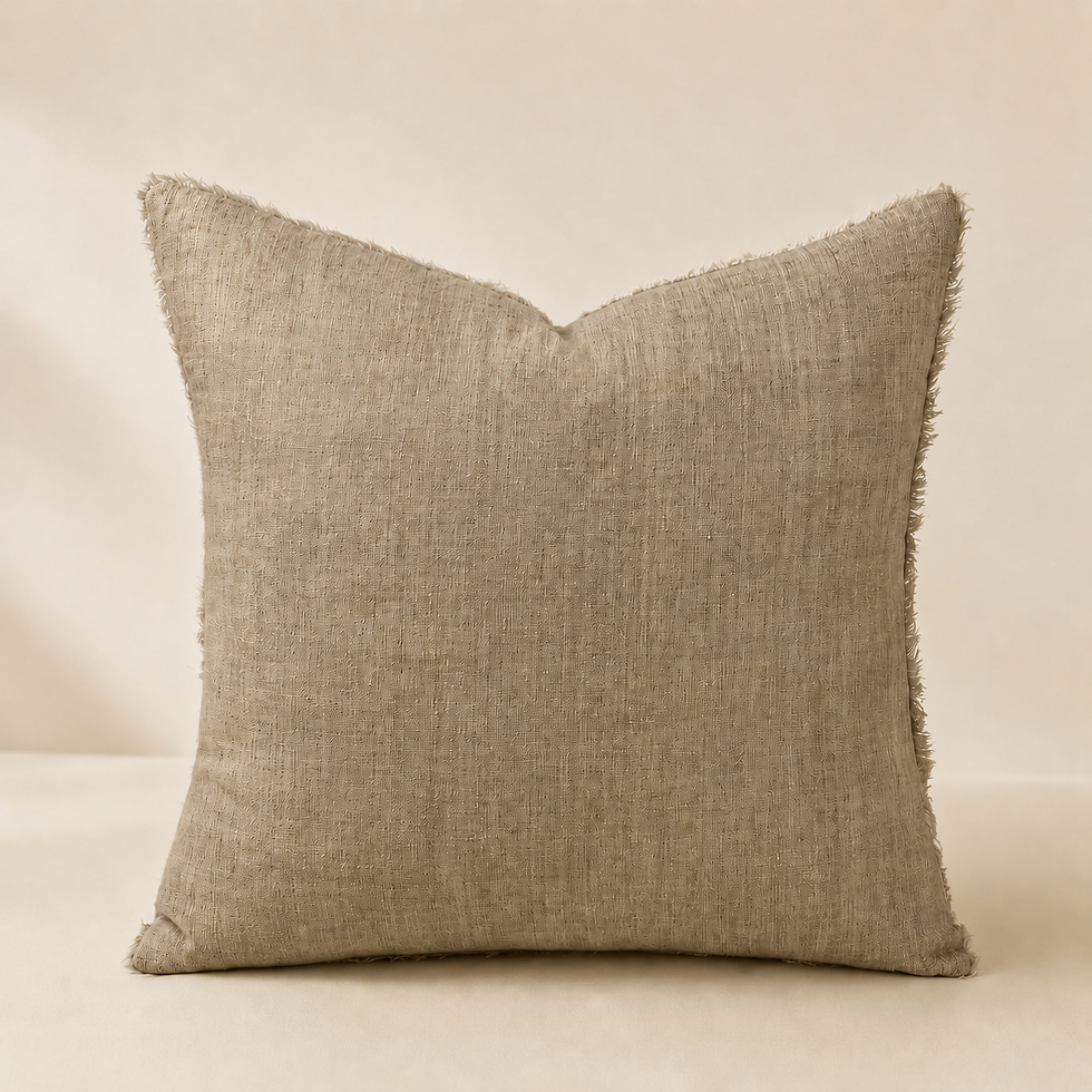 Square textured oat linen pillow with frayed edges.