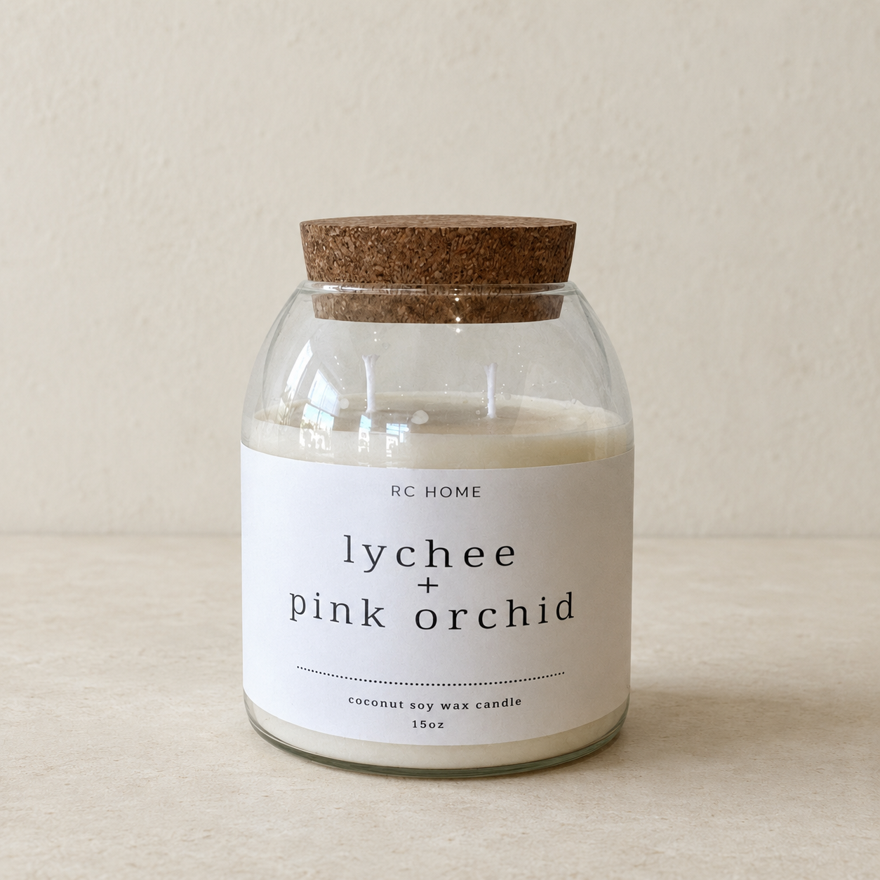 Lychee and Pink Orchid Coconut Soy Candle in a glass jar