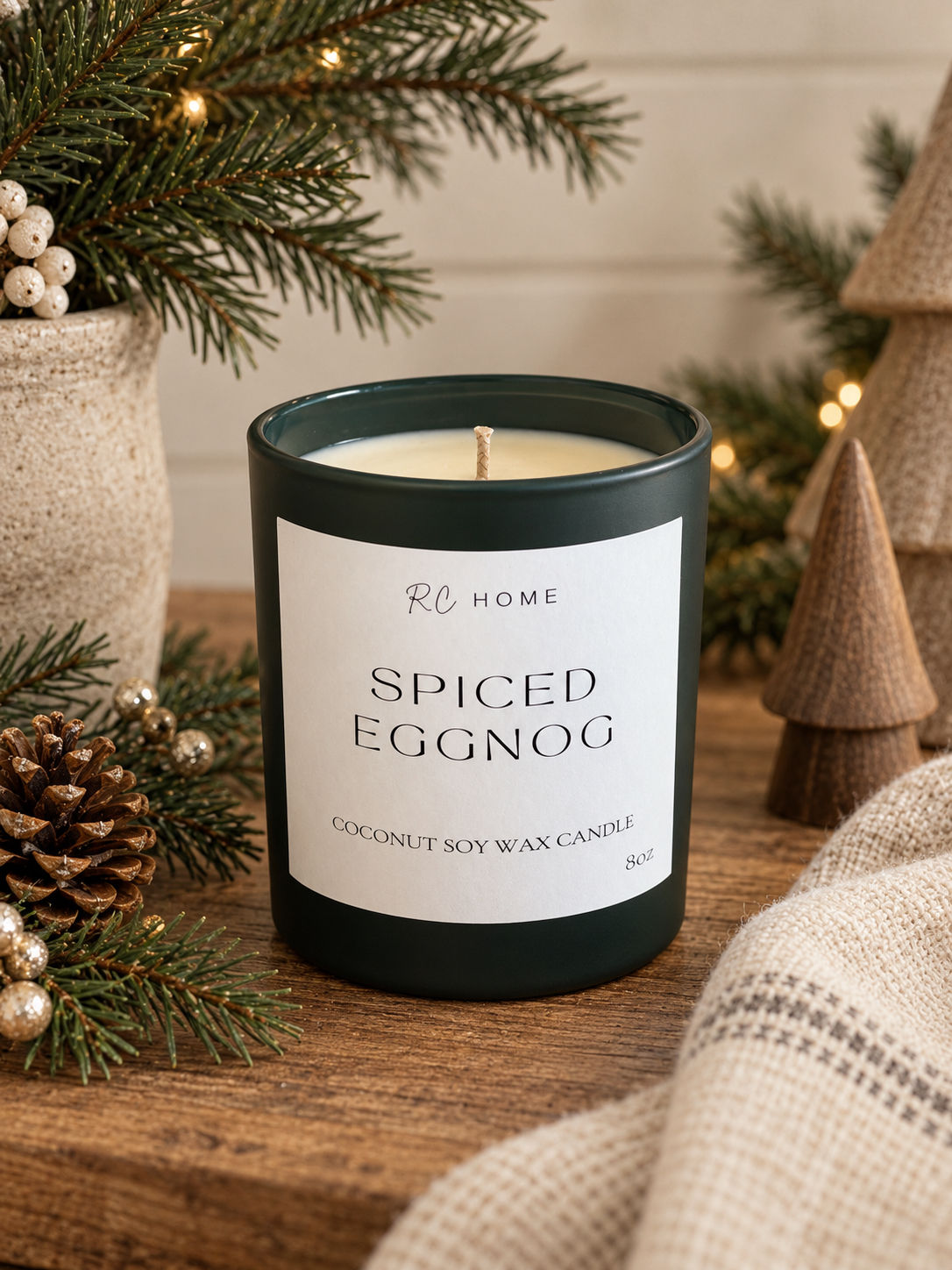 Spiced Eggnog Coconut Soy Wax Candle in a dark green jar