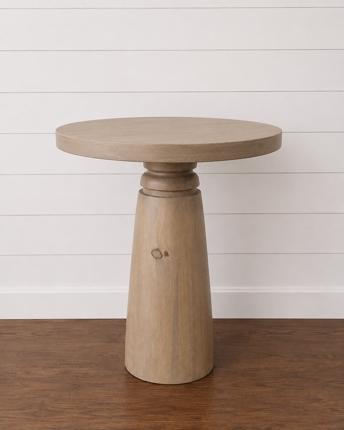 Round Zoe Side Table with a pedestal base.