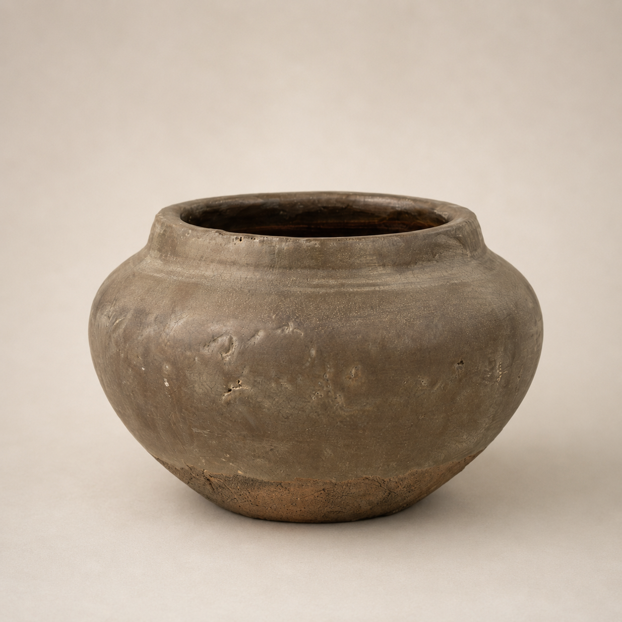 Small antique Relic Vase made of aged grey stone.