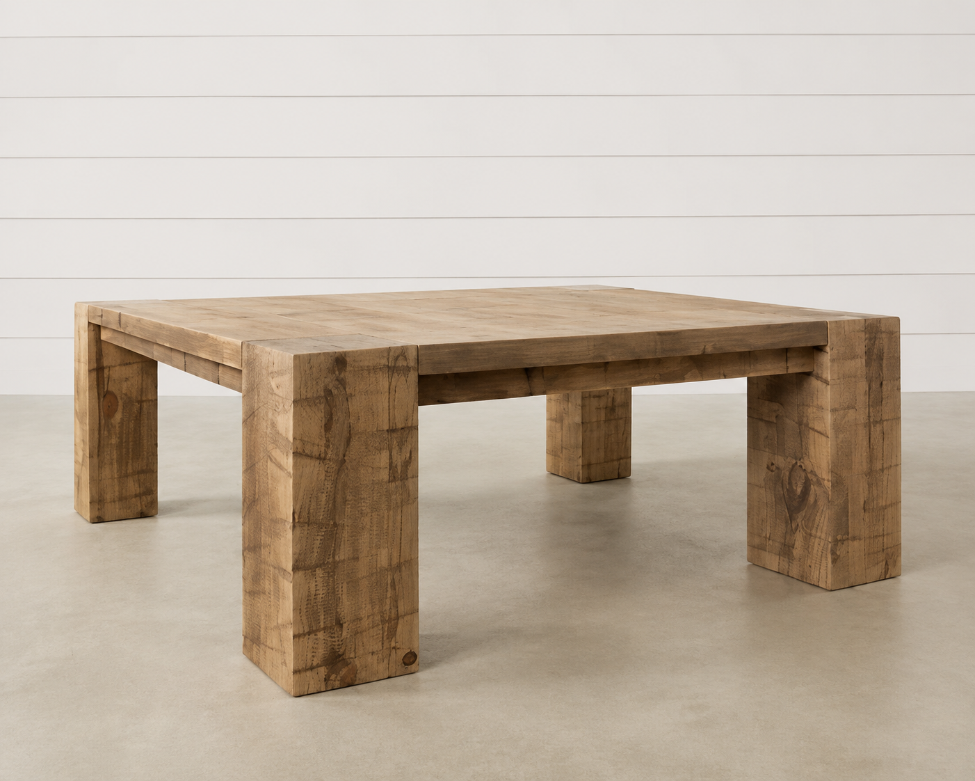 Square wood Brinley coffee table with chunky legs.