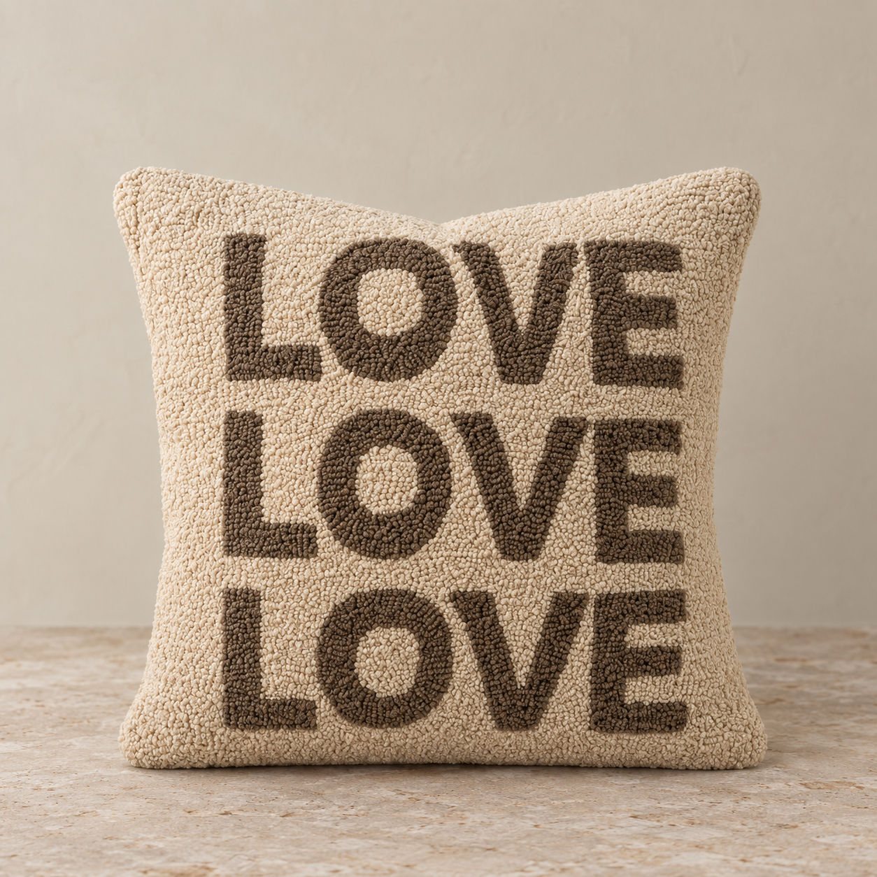 Beige Love Pillow with repeating brown text