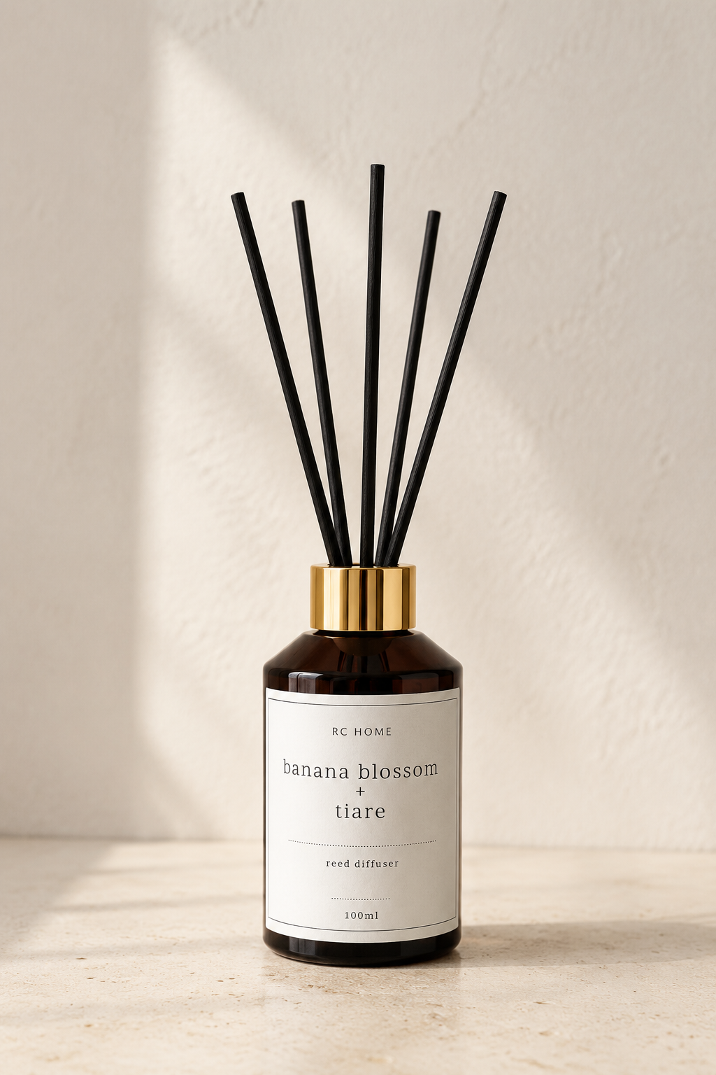 Banana Blossom + Tiare Reed Diffuser in amber bottle