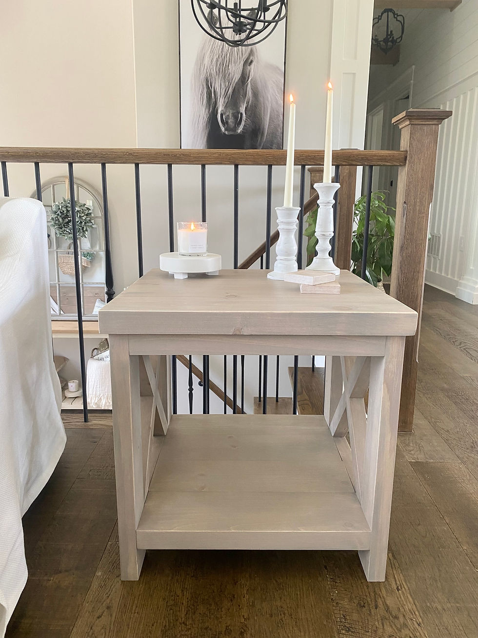 Beige end table with candles