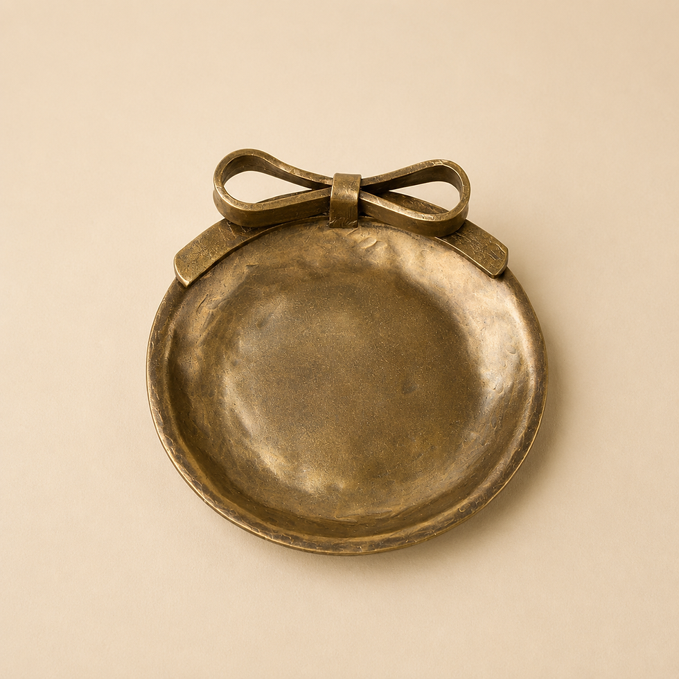 Small round brass bowl with an Iron Bow catchall detail.