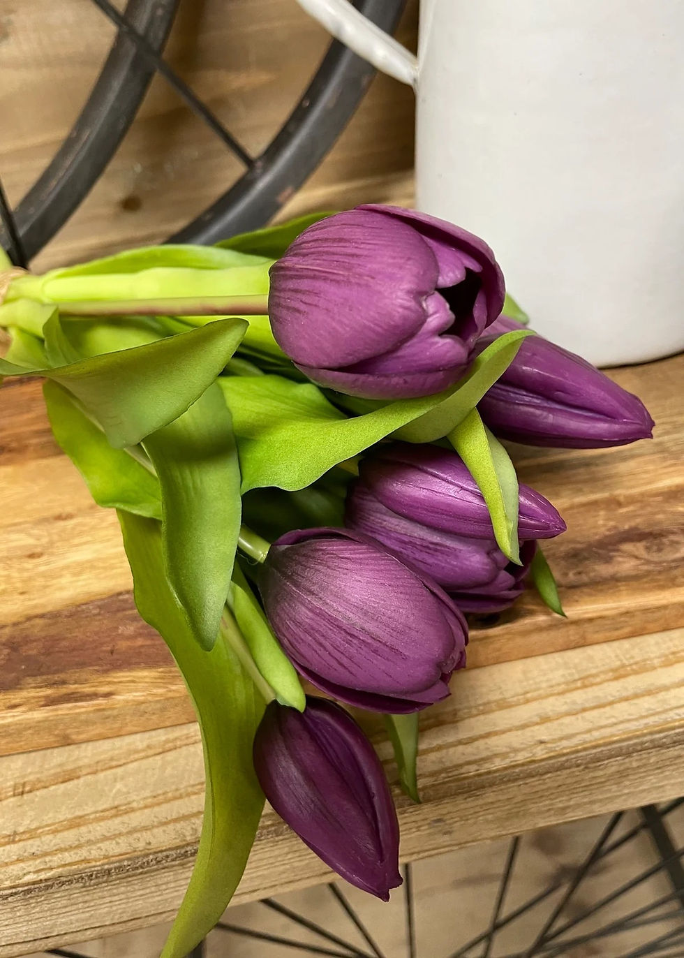 Thumbnail: Purple tulips on a wooden surface