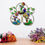 Thumbnail: Colorful metal art with three figures in circles, leaves, and flowers.