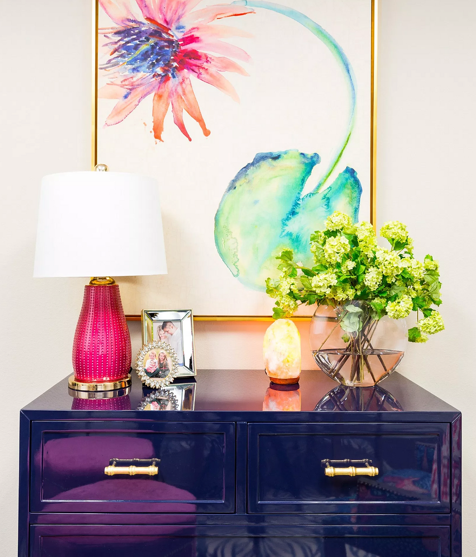 Colorful office space with navy lacquer chest