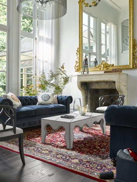 Universal Furniture living room with large gold mirror