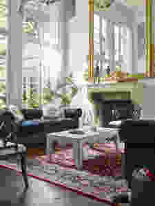 Universal Furniture living room with large gold mirror