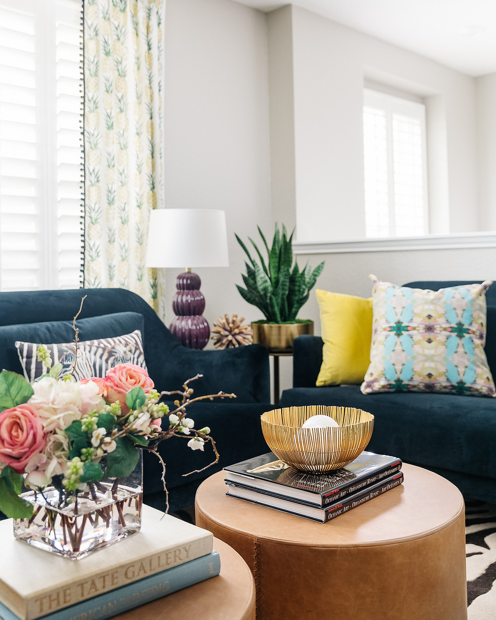 TV lounge with pineapple fabric on draperies