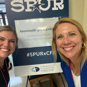 Lauren Anderson and I speaking at a nonprofit conference in August 2025