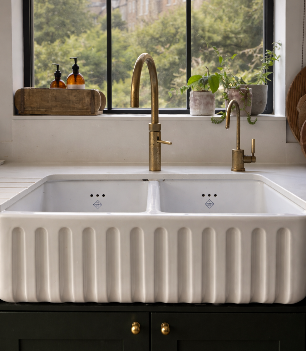The kitchen in one of our recently completed projects with a Quooker tap and Perrin & Rowe filter water tap.