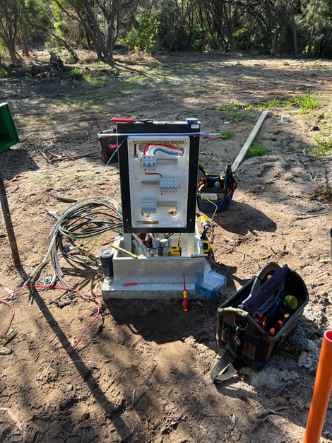 Outdoor electrical control box with warning sign