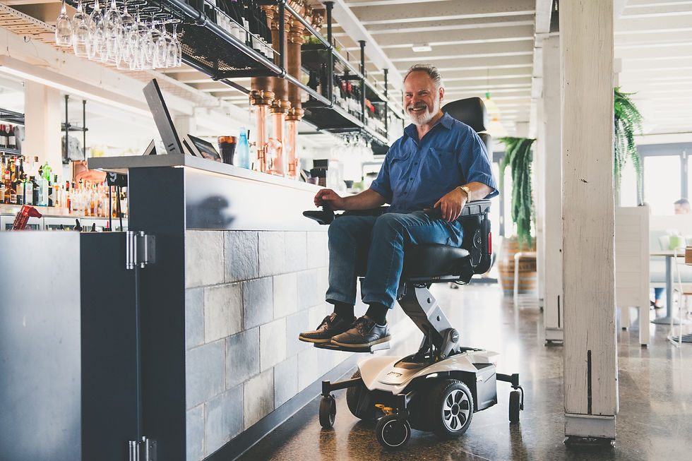 Powered wheelchair in Melbourne being serviced by Mobility in Motion technician to ensure smooth performance and long-term independence for daily mobility needs.