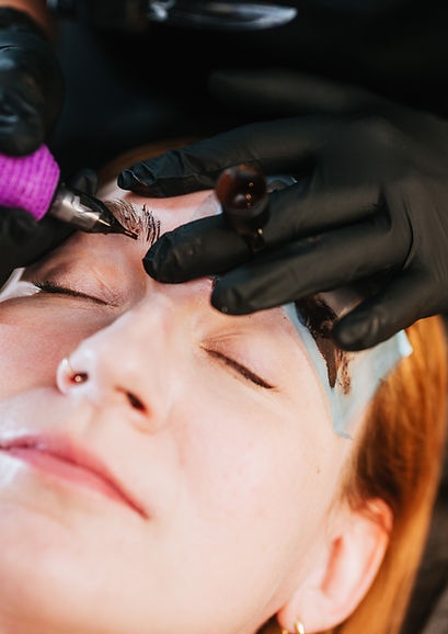 Paramedical tattoo artist with tattoo machine