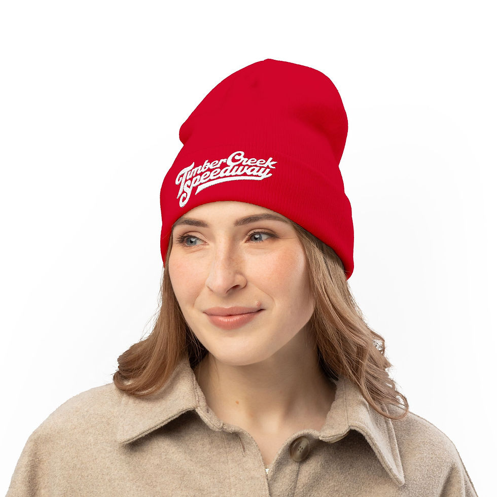 Thumbnail: Woman wearing an embroidered cozy beanie in red