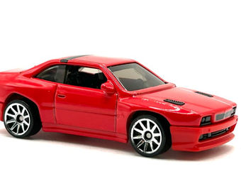 A side view of a Maserati Shamal diecast car