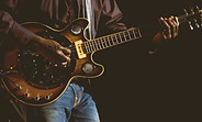 Playing an electric guitar