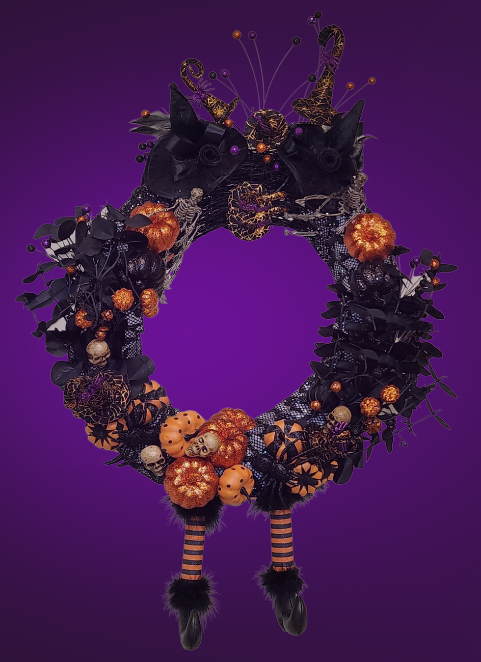Halloween wreath purple background witch hats pumpkins witch's legs